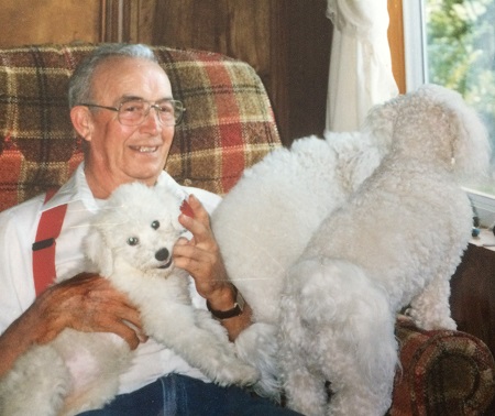 I Swan--Uncle Lowell and three dogs