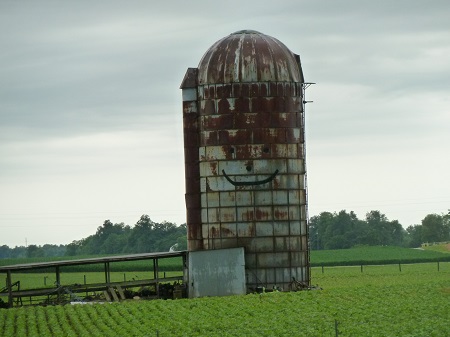 Burst with Joy--old silo with smiling face