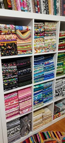 The Whole Nine Yards--shelves of fabric