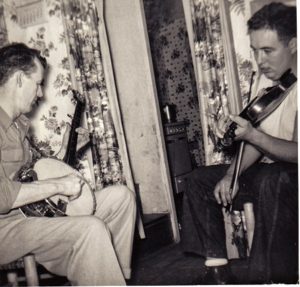 Two Peas in a Pod--two men playing banjo and fiddle