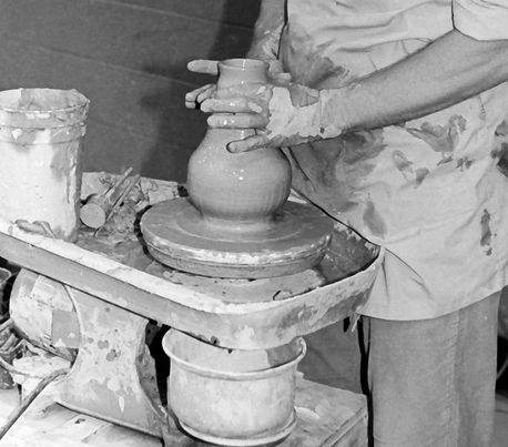 Idle Hands Are the Devil's Tools-hands shaping pottery