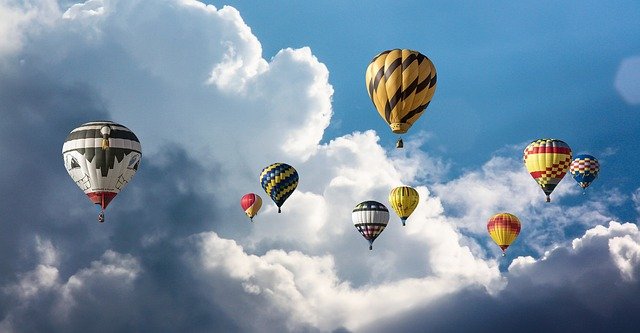 On the Up and Up--hot air balloons in front of clouds